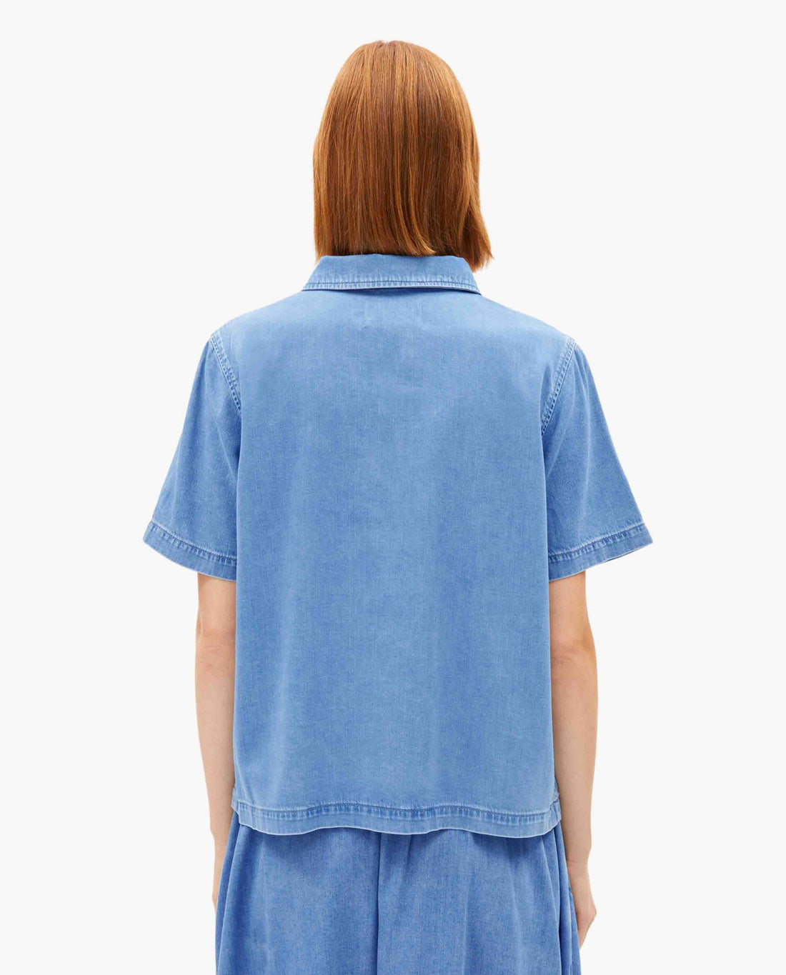 marche commun polo zippe en denim bleu armedangels