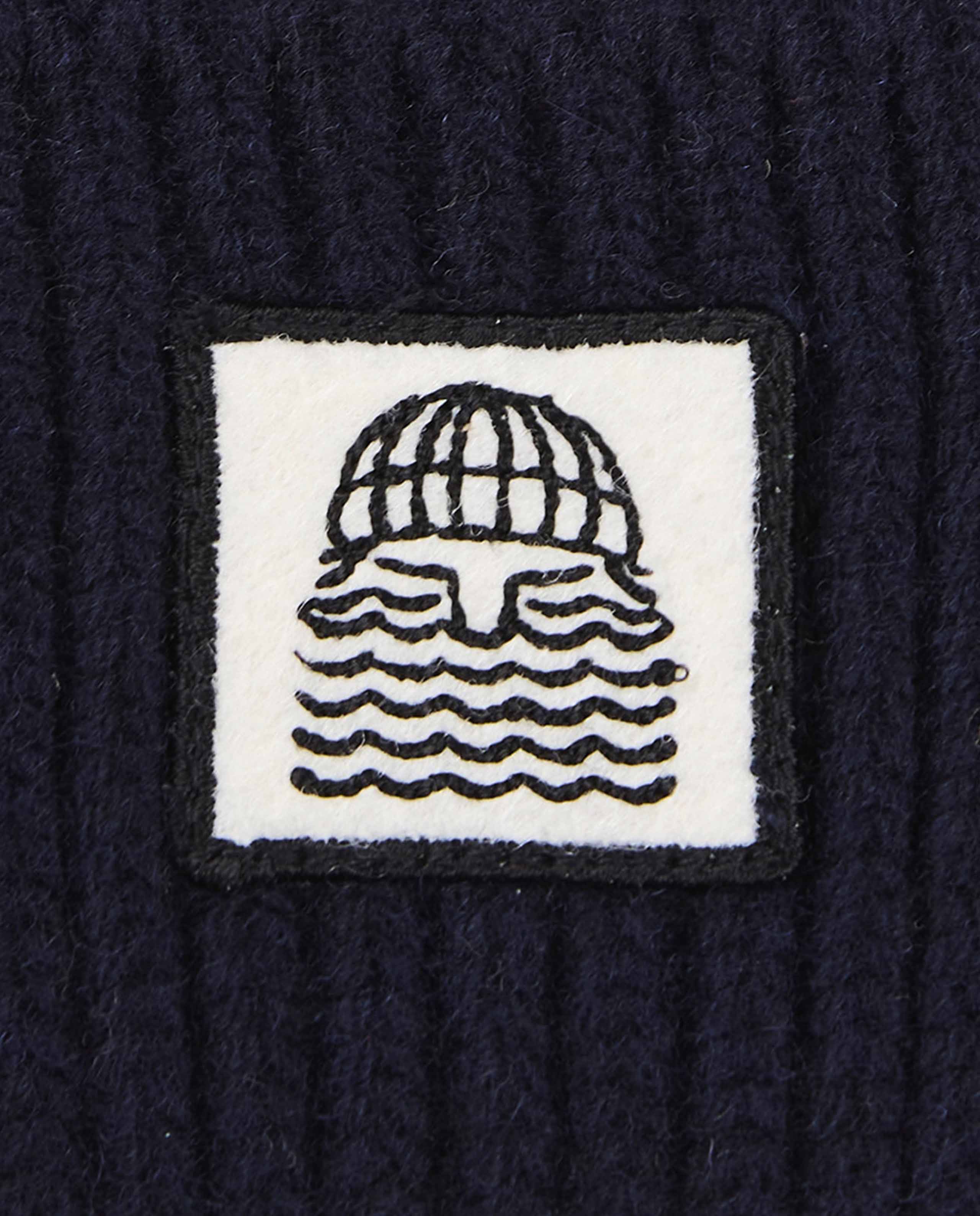 Bonnet côtelé en laine mérinos