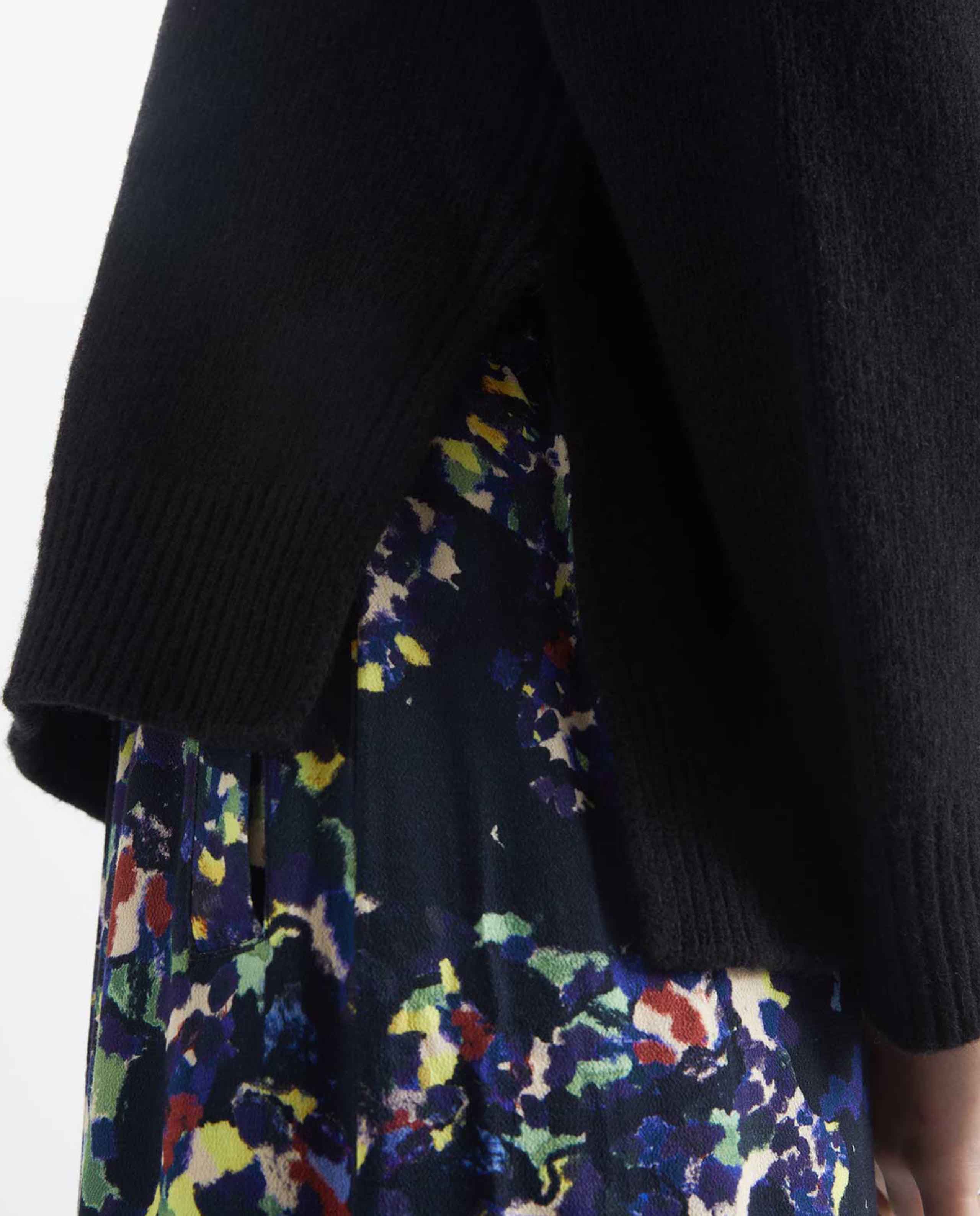 Pull col roulé en maille recyclée