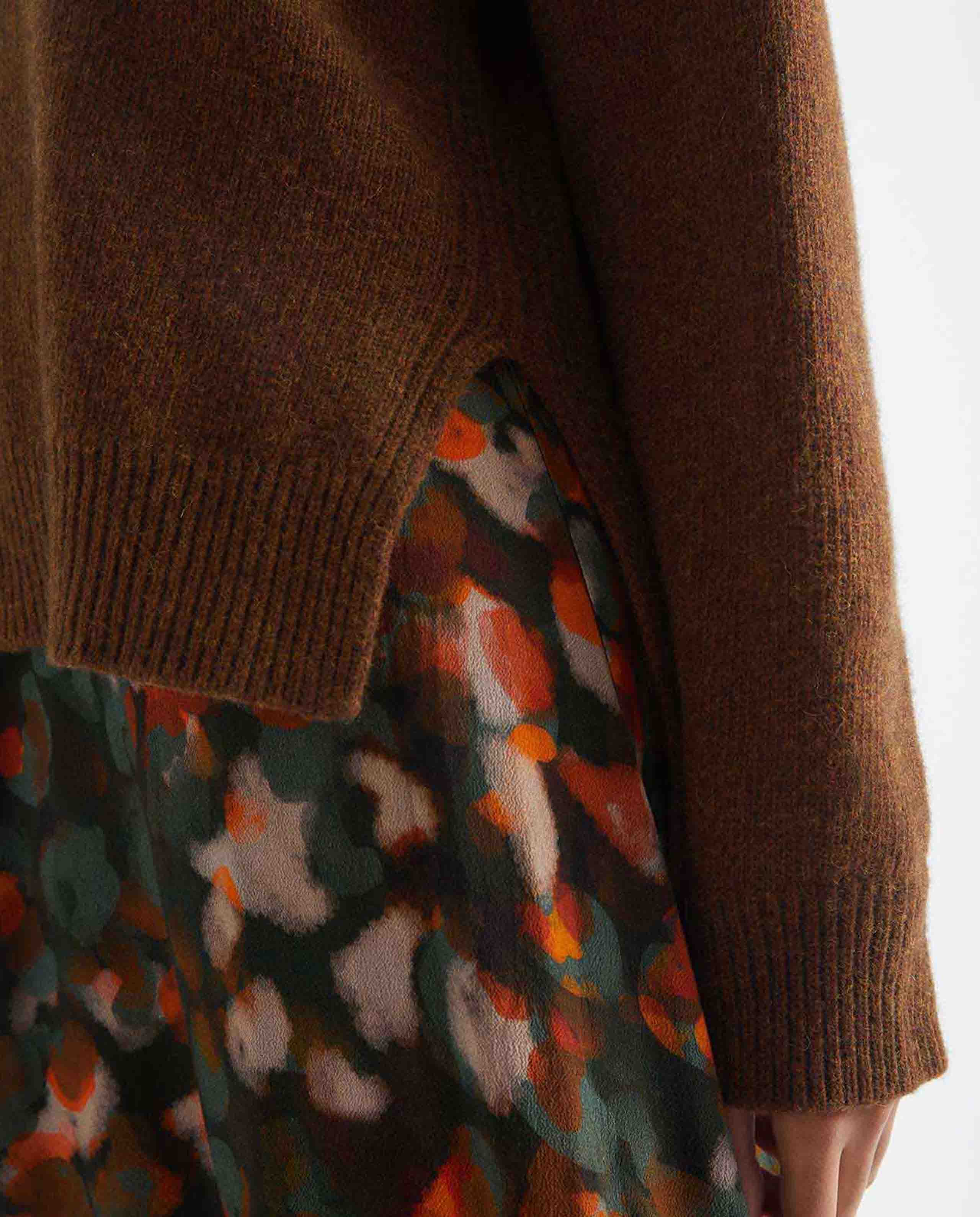 Pull col roulé en maille recyclée