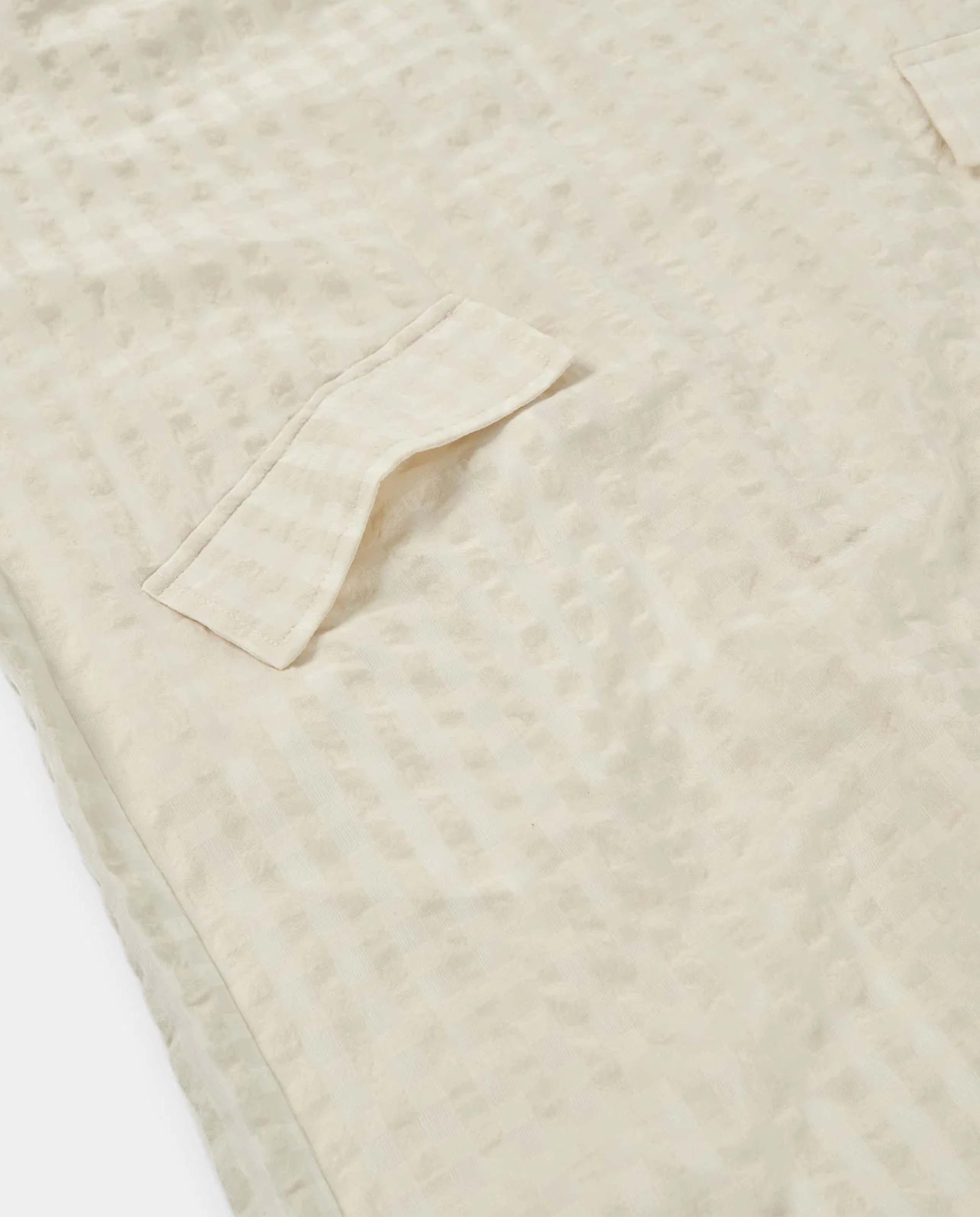 Marché Commun robe en coton bio écru gaufrée Loreak Mendian