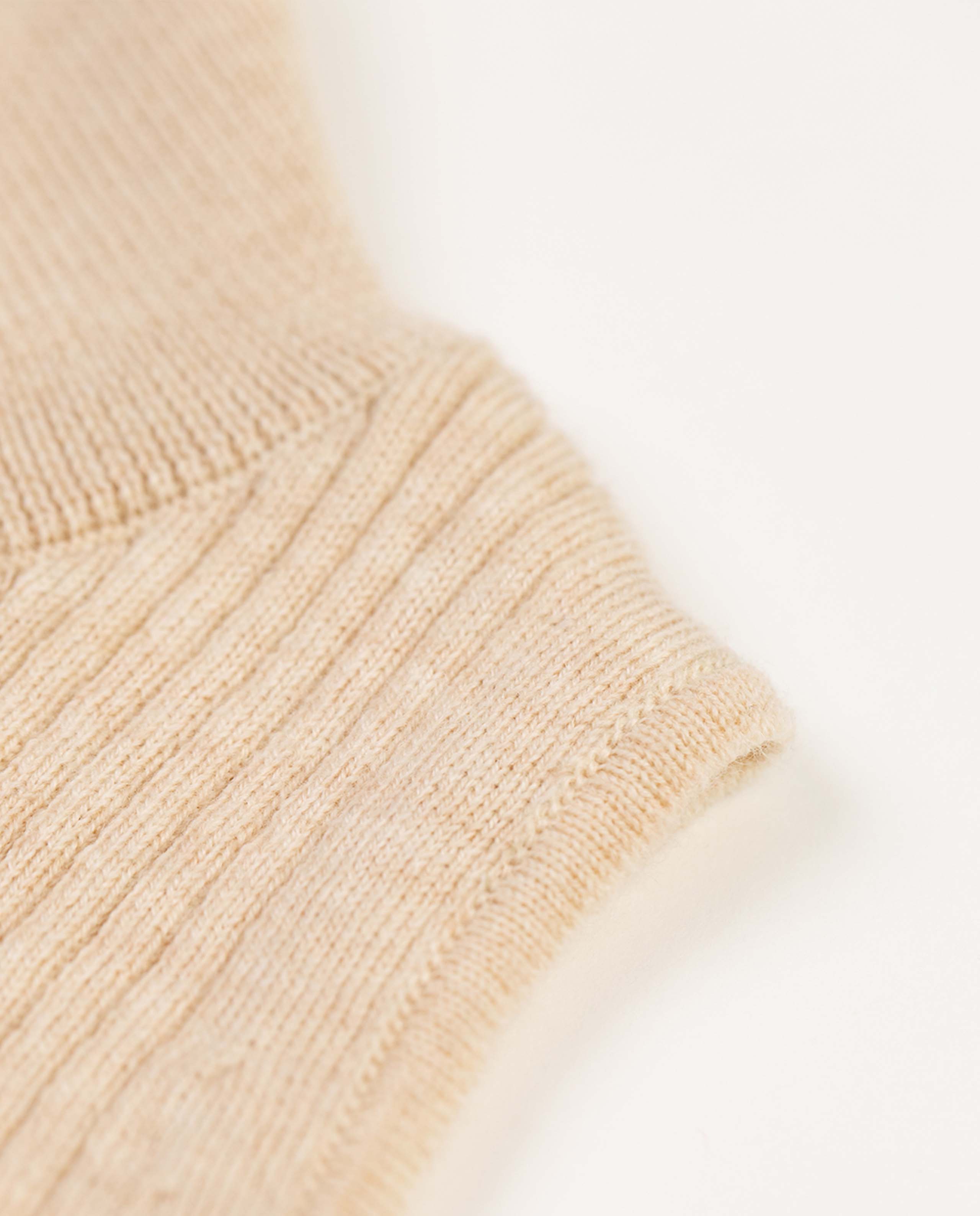 Marché Commun Col roulé sans manches en laine mérinos sable Rotholz