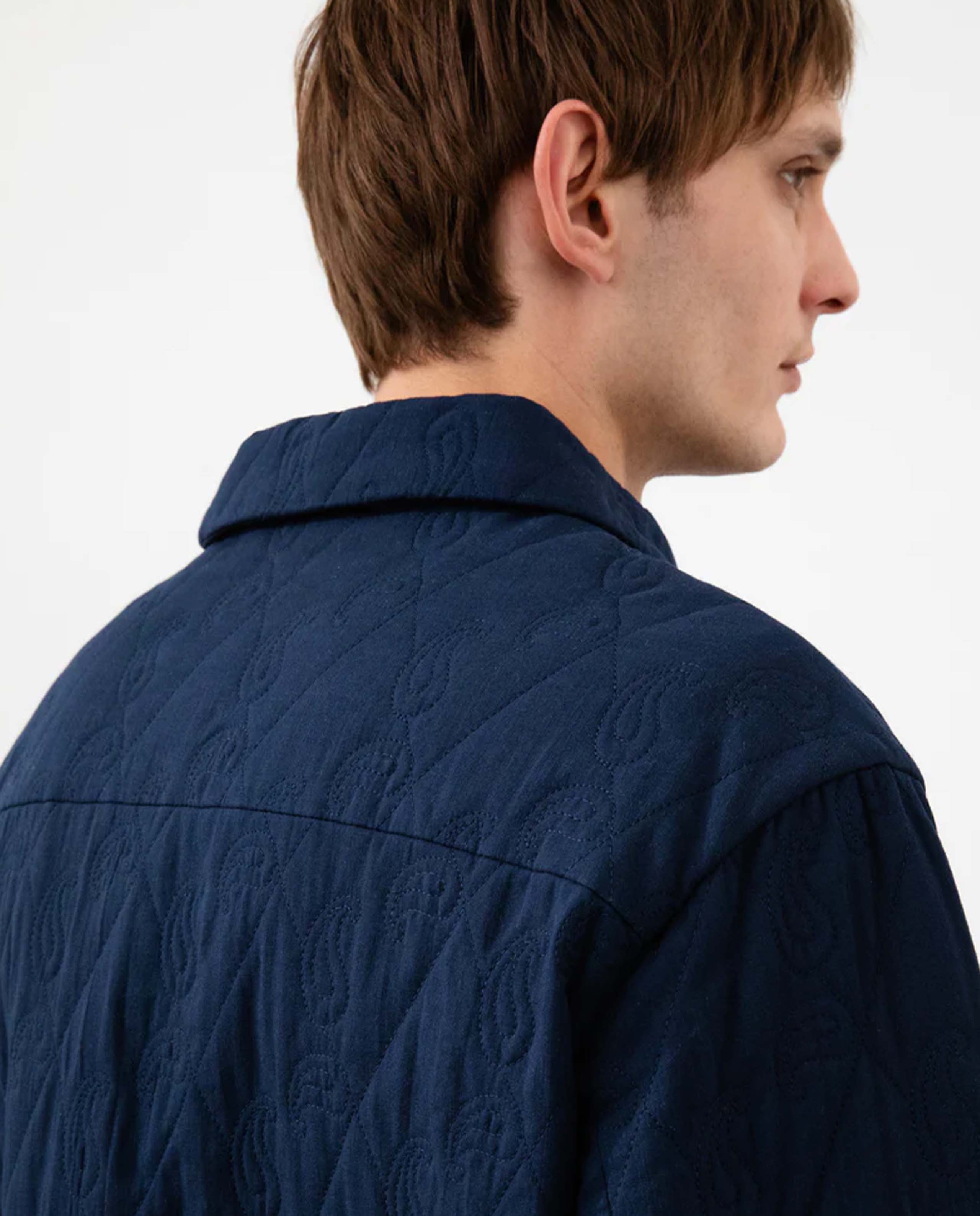 marché commun veste liner matelassée en coton bio bleu marine rotholz