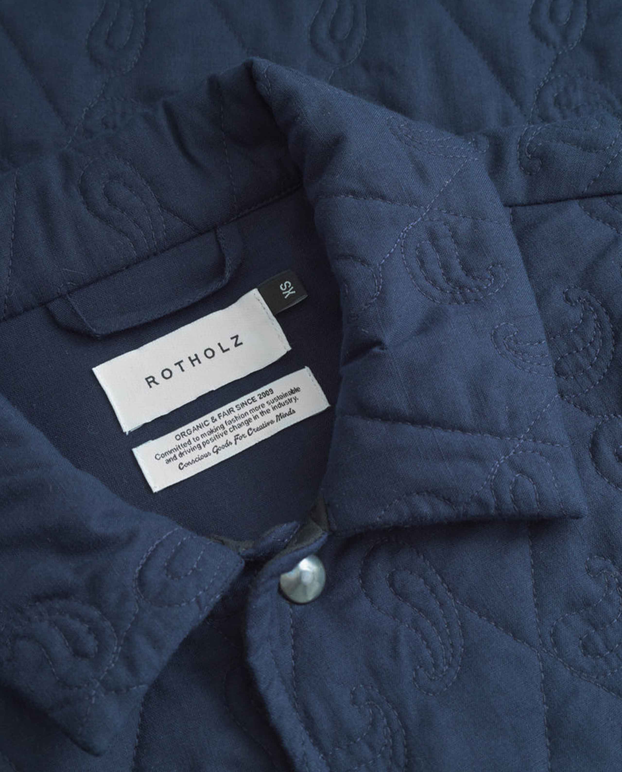 marché commun veste liner matelassée en coton bio bleu marine rotholz