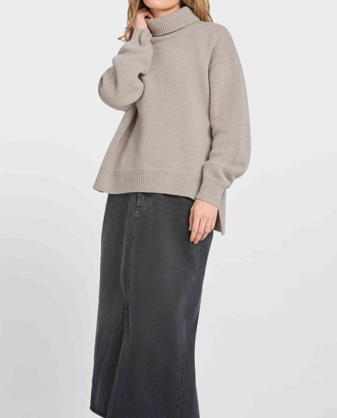 Pull col roulé en maille recyclée