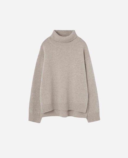Pull col roulé en maille recyclée