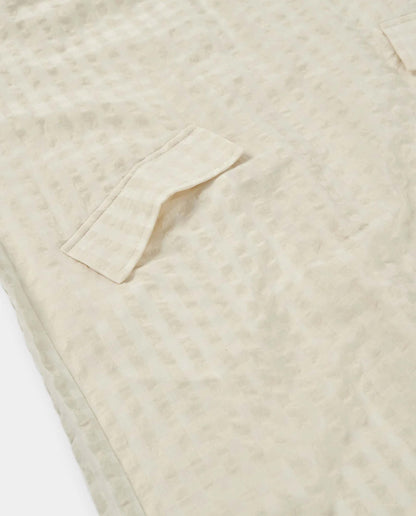 Marché Commun robe en coton bio écru gaufrée Loreak Mendian
