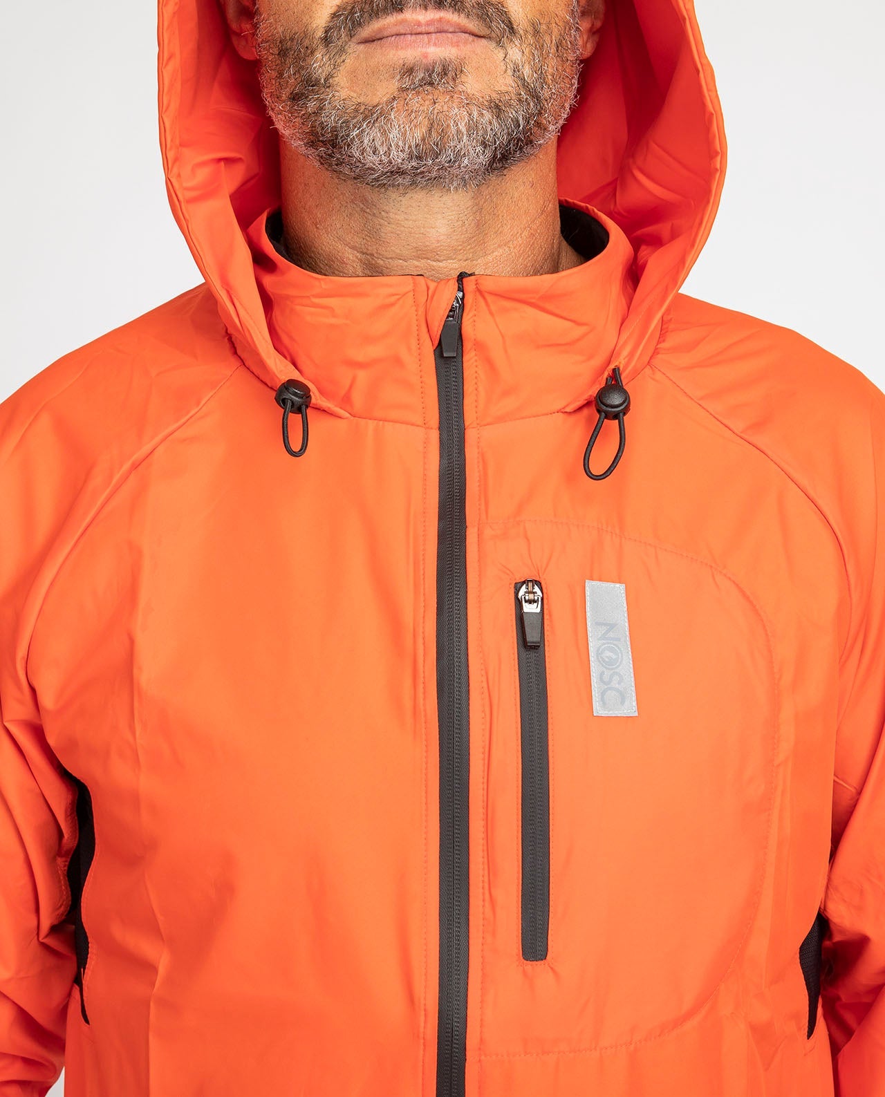 marché commun nosc veste de sport homme coupe vent déperlante recyclée fabriquée en Europe éco-responsable éthique orange